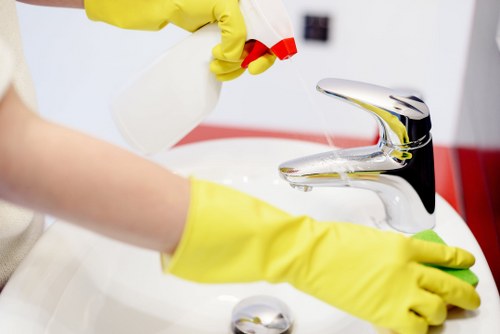 Professional upholstery cleaning equipment in use on a chair