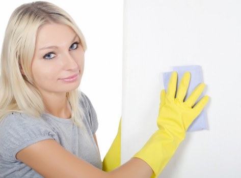 Technician performing deep sofa cleaning in Dubai